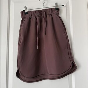 Lululemon On The Fly Skirt 
Cherry Cola Size 2 NWOT
